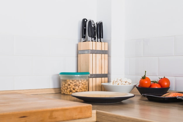 Kitchen corner with food and knifes