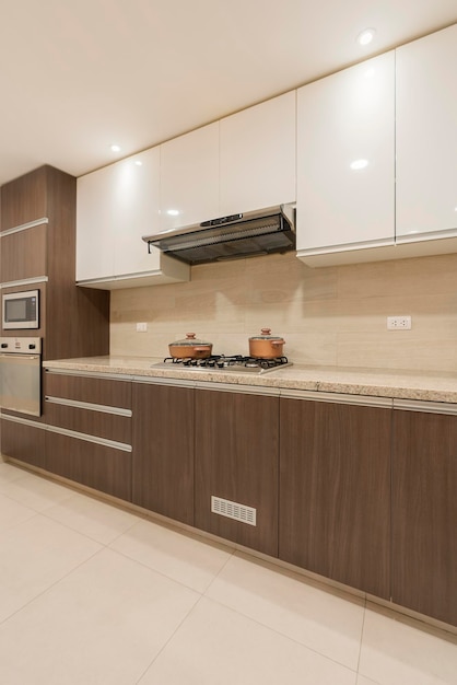 Kitchen counters with stove top and built-in ovens