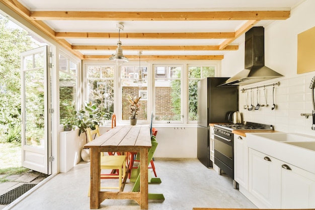 Kitchen and dining zone in modern apartment