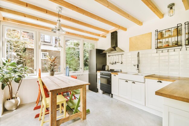 Kitchen and dining zone in modern apartment