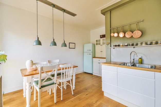 Kitchen and dining zone in modern apartment