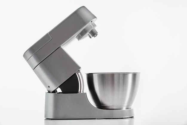 Kitchen electric mixer on white background Food processor closeup