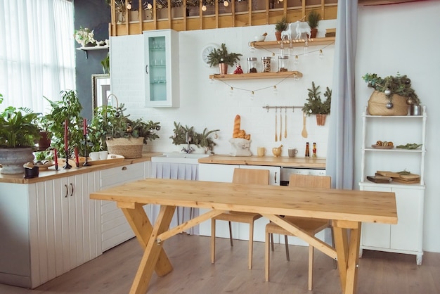 Kitchen interior of white furniture and Christmas time decoration