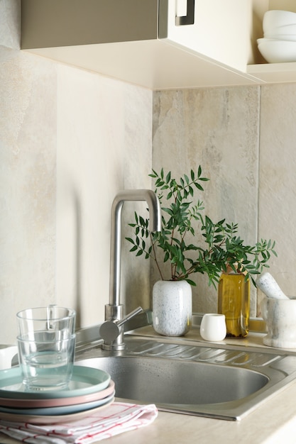 Kitchen interior with sink and different supplies