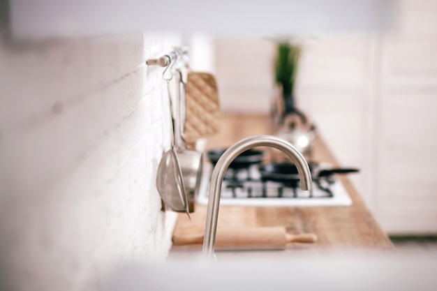 Kitchen macro shot in white and wood tones