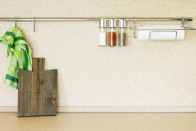 Kitchen marble table with cutting board and spices