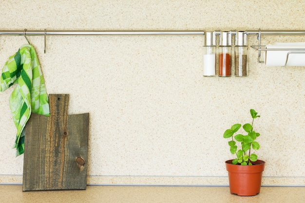 Kitchen marble table with cutting board and spices