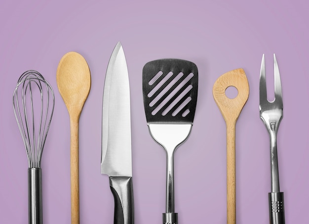 Kitchen metal and wooden utensil on  background