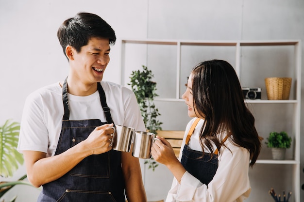 In Kitchen Perfectly Happy Couple Preparing Healthy Food Lots of Vegetables Man Juggles with Fruits Makes Her Girlfriend Laugh Lovely People in Love Have Fun