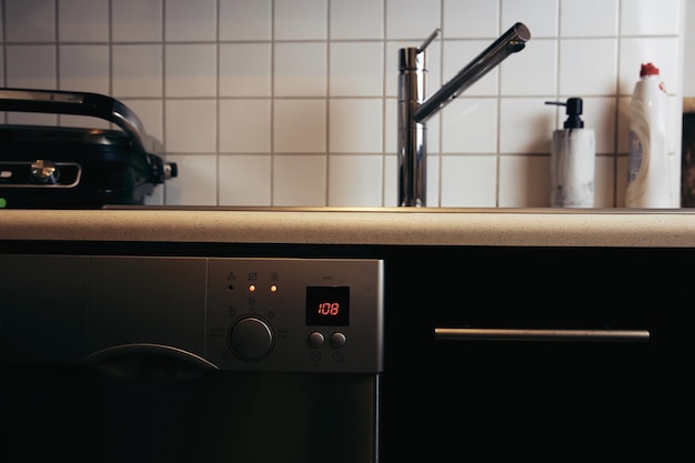 Kitchen sink with mixer tap