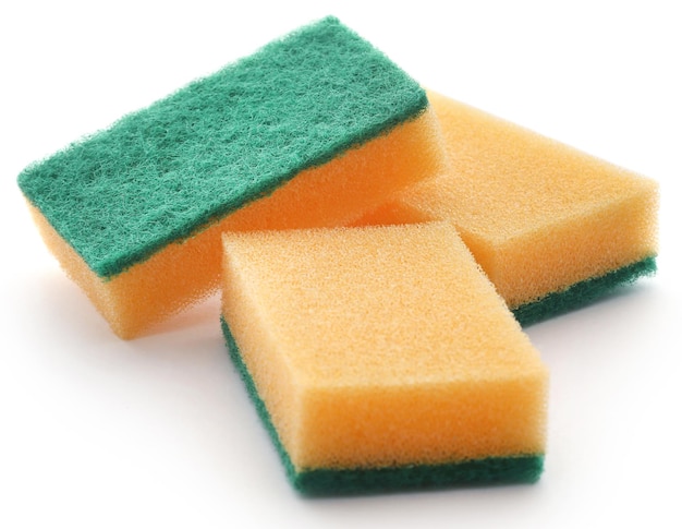 Kitchen sponge with scotch brite over white background