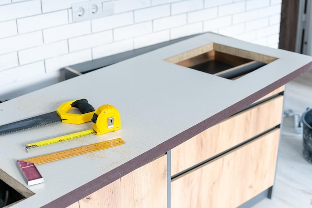 In the kitchen, the square is square-cut for installation of the countertop