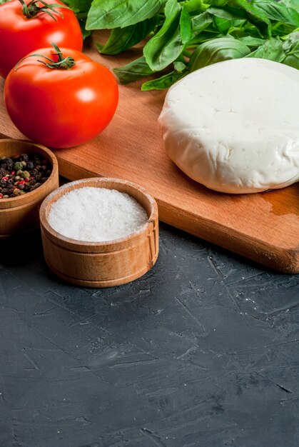 Kitchen table with ingredients, Italian food