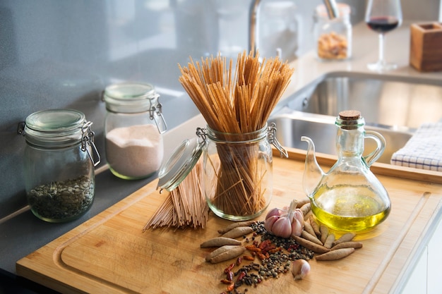 Kitchen table with spaghetti oil and spices