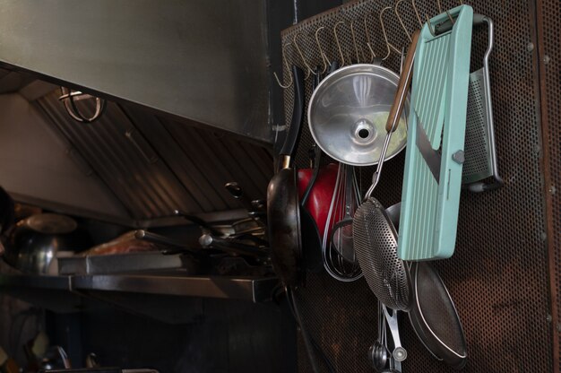 Kitchen tools on a wall.