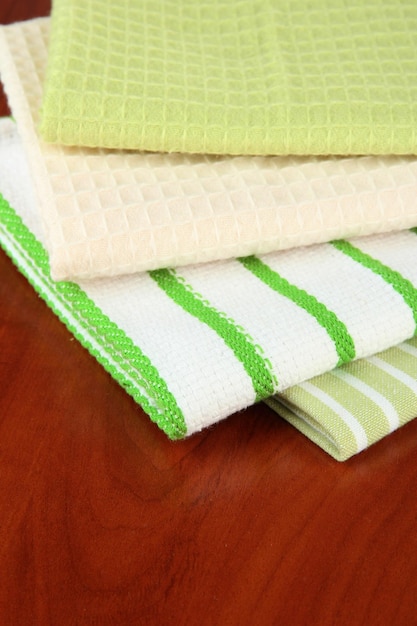 Kitchen towels on wooden background