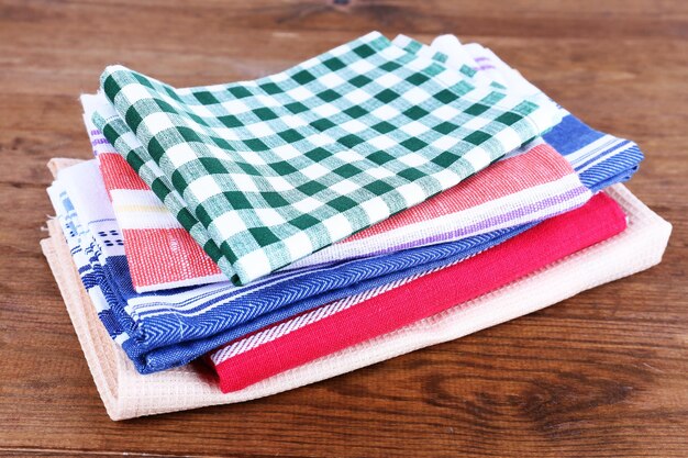 Kitchen towels on wooden background