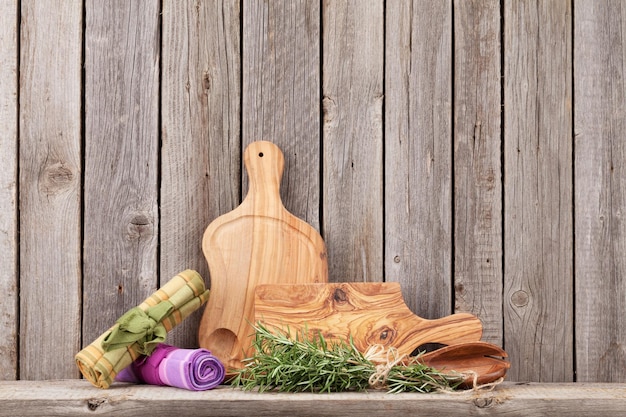 Kitchen utensils herbs and spices on shelf