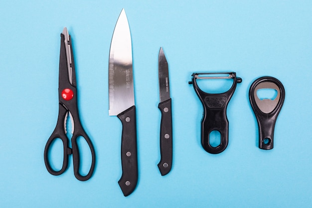 Kitchen utensils isolated on blue background