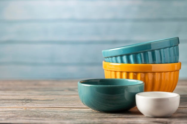 Kitchen utensils on wooden background