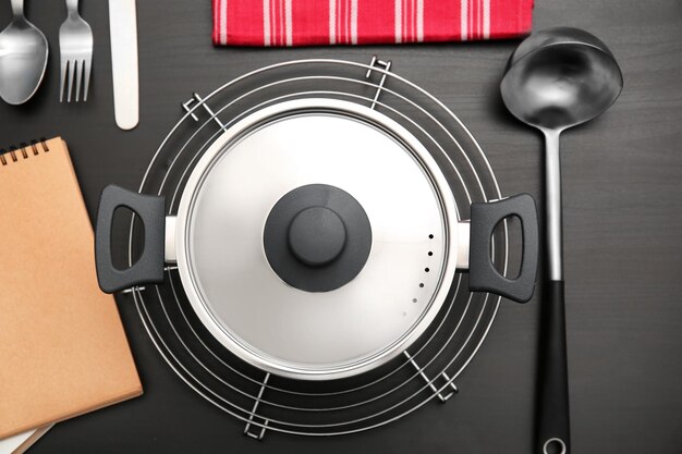 Kitchen utensils on wooden table