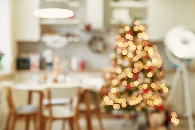 Kitchen with Christmas decoration in blurred style