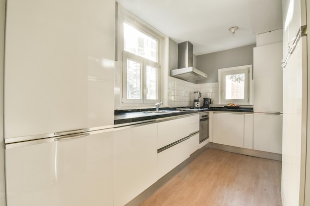 Kitchen with contemporary furniture and appliances