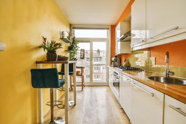 A kitchen with a counter top and a sink