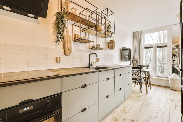 Kitchen with minimalist style cupboards