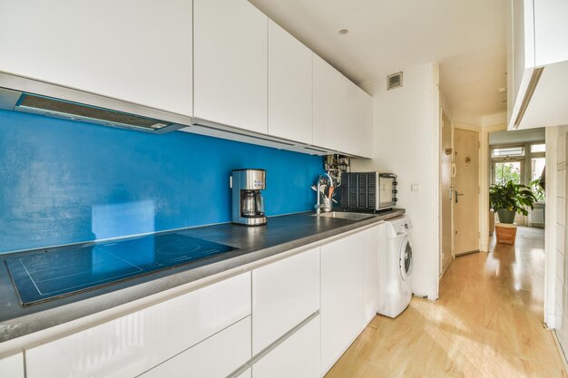 Kitchen with minimalist style cupboards