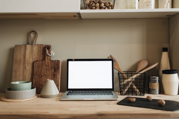 Kitchen workspace with laptop