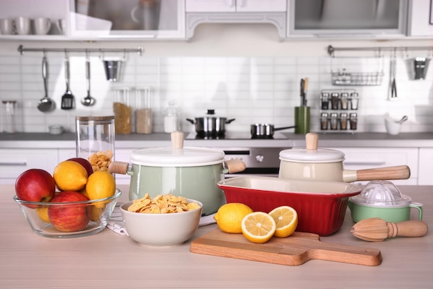 Kitchenware for cooking classes on wooden table