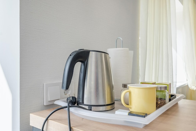 Kitchenware and household utensils on kitchen shelves