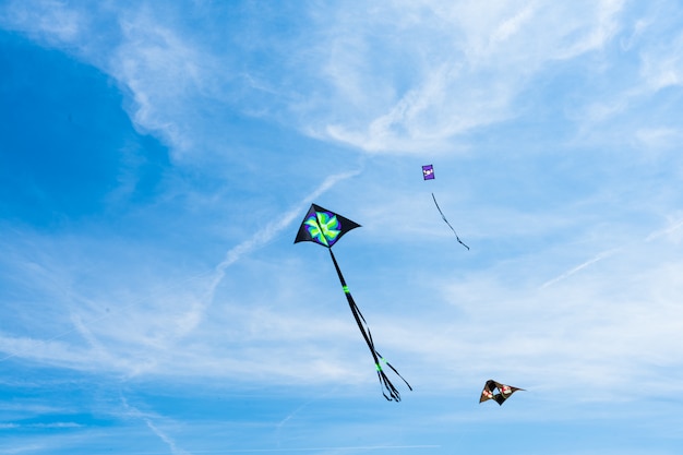 Kite flying in the sky among the clouds