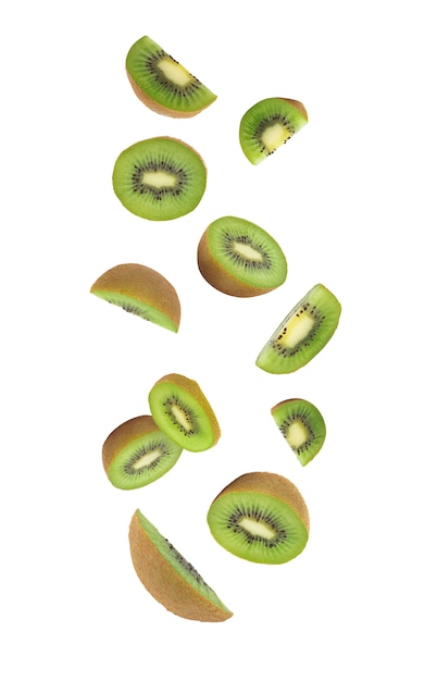 Photo kiwi fruit falling isolated on white background with clipping path