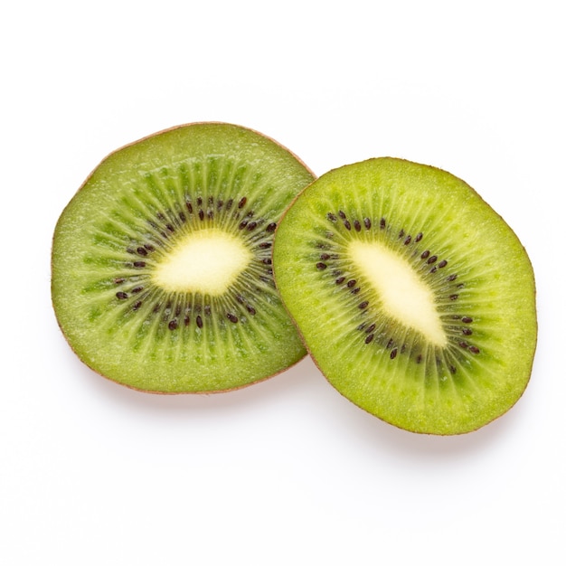 Kiwi fruit Slices macro. Ripe Kiwi fruit isolated on white surface. flat lay.Fresh tropical.