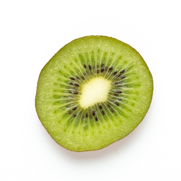 Kiwi fruit Slices macro. Ripe Kiwi fruit isolated on white surface. flat lay.