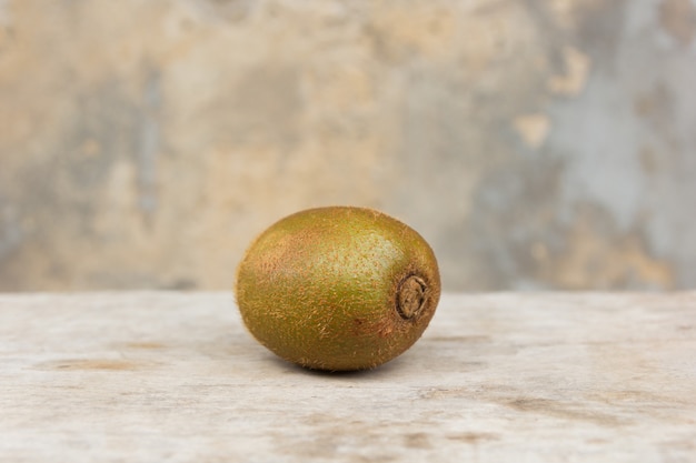 Kiwi fruit on wooden background