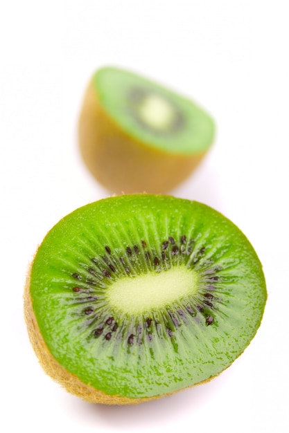 Kiwi halves on white background