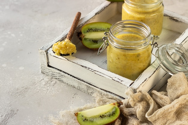 Kiwi jam in a preserving glass