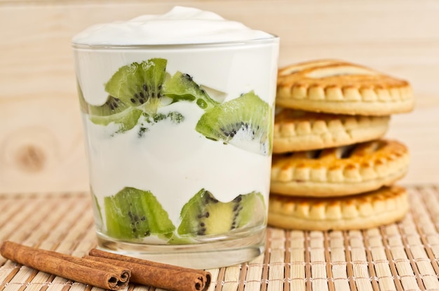 Kiwi slices in a glass with cream