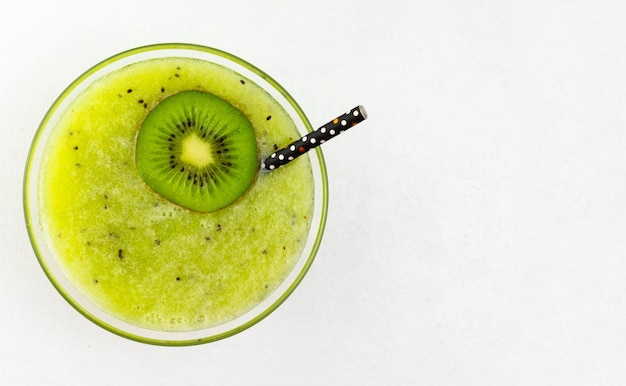 Kiwi smoothie on a white background Top view Copy space