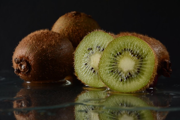 Kiwi in water with bubbles