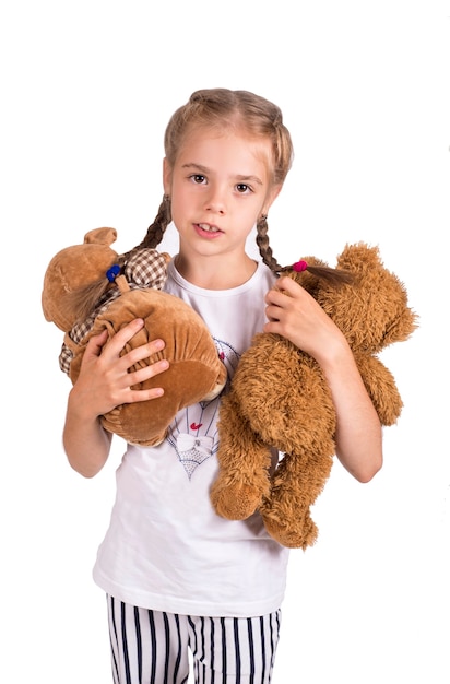 Klein meisje met een teddybeer