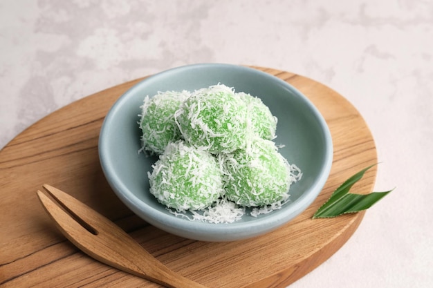 Klepon is Indonesian popular traditional snack made from glutinous rice flour with brown sugar