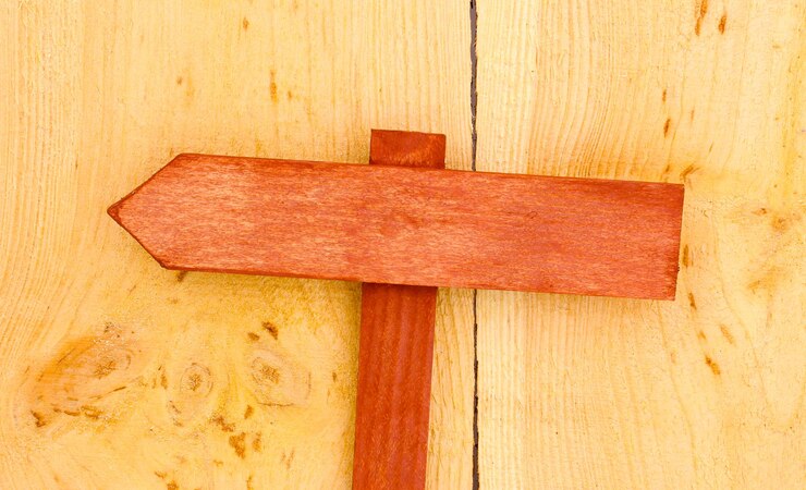 Foto kleur houten bord op houten achtergrond