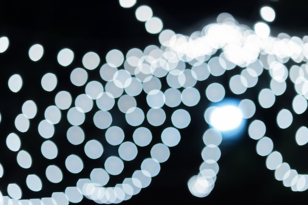 Foto kleurrijk licht abstracte cirkelbokeh van kerstmis en gelukkige nieuwe jaarachtergrond.