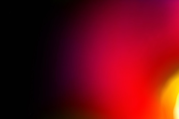 Kleurrijke abstracte achtergrond Blur neonlicht Intreepupil levendige magenta roze rood gele kleurverloop gloed op zwarte poster met lege ruimte