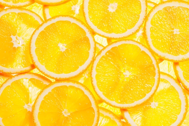 Kleurrijke oranje citrusvruchten plakjes achtergrondverlichting