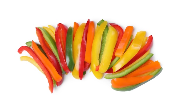 Kleurrijke paprika's gesneden in stokjes op witte achtergrond bovenaanzicht Gezonde groenten